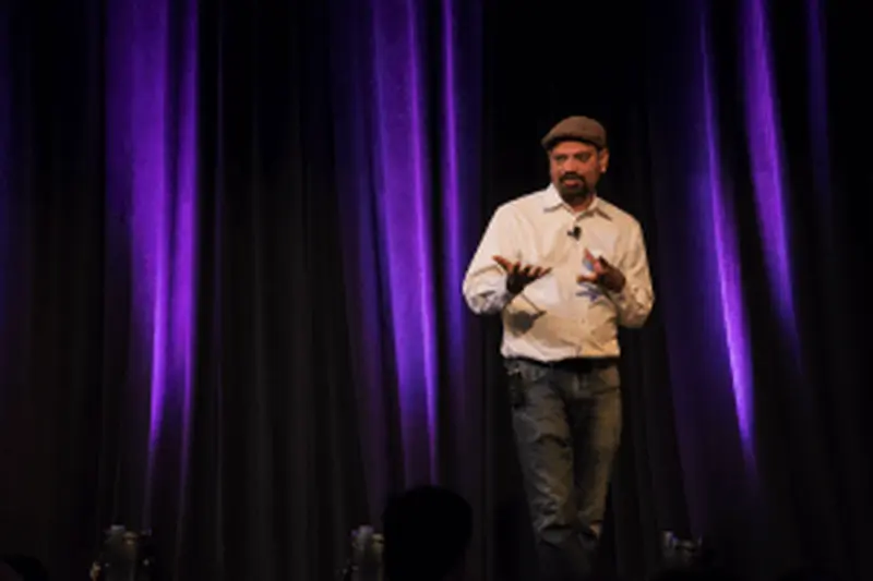Person standing on stage 