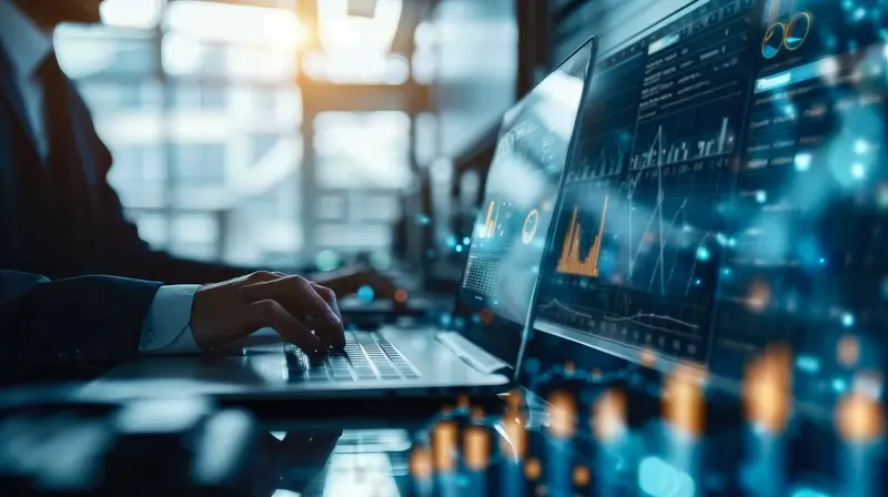 Hands at a laptop beside trading screens