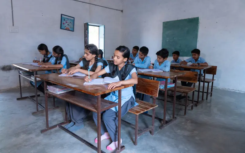 Students at desks in a classroom